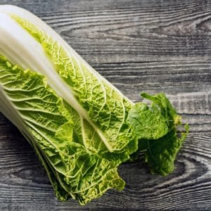 Napa or Chinese cabbage on wooden background